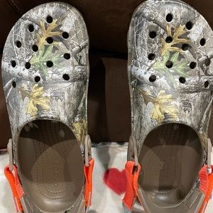 Crocs. Men’s size 9 and women’s size 11